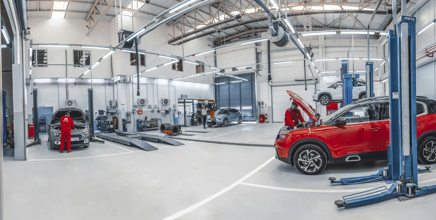 Illustrative photograph of a bright automotive service workshop